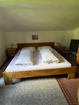 Ein Bett oder Betten in einem Zimmer der Unterkunft Schmidhof