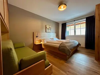 Ein Bett oder Betten in einem Zimmer der Unterkunft Apartment Iglsberg Top 6