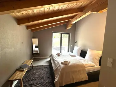 Ein Bett oder Betten in einem Zimmer der Unterkunft Chalet in Niederau