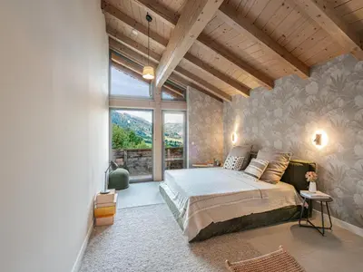 Ein Bett oder Betten in einem Zimmer der Unterkunft Chalet in Niederau