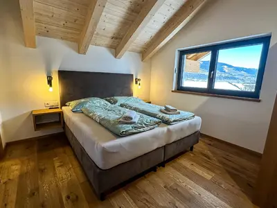 Ein Bett oder Betten in einem Zimmer der Unterkunft Ours Living Penthaus - inkl private Sauna