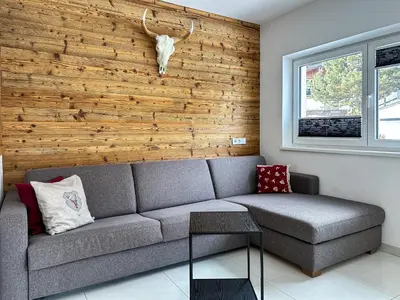 Ein Sitzbereich in der Unterkunft Ours Living Hohe Tauern - inkl Sauna