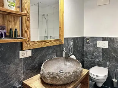 Ein Badezimmer in der Unterkunft Ours Living Kitzsteinhorn Gletscher - inkl Sauna