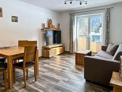 Ein Sitzbereich in der Unterkunft Ours Living Kitzsteinhorn Gletscher - inkl Sauna