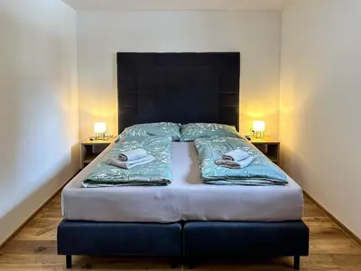 Ein Bett oder Betten in einem Zimmer der Unterkunft Ours Living Larmkogel - inkl Sauna