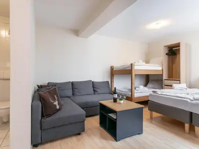 Ein Sitzbereich in der Unterkunft Town House 1 und 2