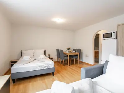 Ein Bett oder Betten in einem Zimmer der Unterkunft Town House 1 und 2