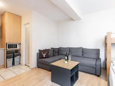 Ein Sitzbereich in der Unterkunft Town House 1 und 2