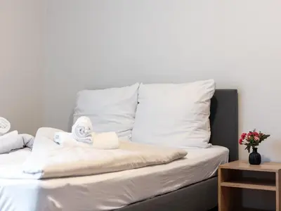 Ein Bett oder Betten in einem Zimmer der Unterkunft Town House 2