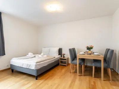 Ein Bett oder Betten in einem Zimmer der Unterkunft Town House 2