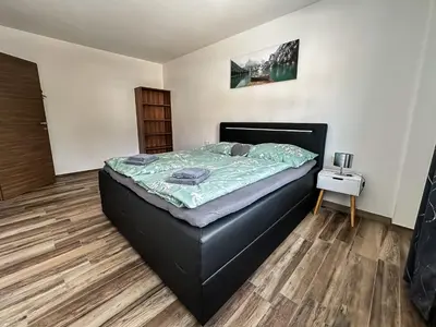Ein Bett oder Betten in einem Zimmer der Unterkunft Ours Living Tauernkogel - inkl Sauna