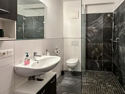 Ein Badezimmer in der Unterkunft Ours Living Tauernkogel - inkl Sauna