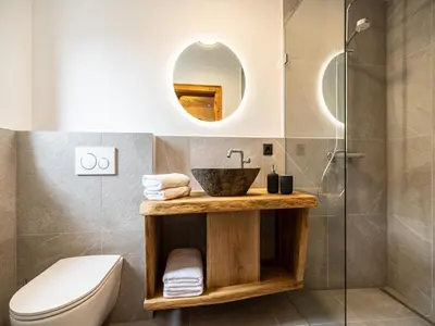 Ein Badezimmer in der Unterkunft Tirola Chalet Alpbach