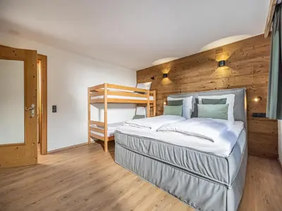 Ein Bett oder Betten in einem Zimmer der Unterkunft Tirola Chalet Alpbach