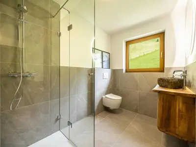 Ein Badezimmer in der Unterkunft Tirola Chalet Alpbach