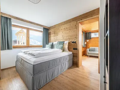 Ein Bett oder Betten in einem Zimmer der Unterkunft Tirola Chalet Alpbach
