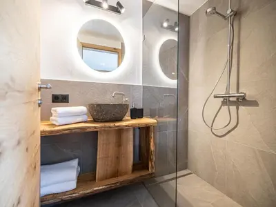 Ein Badezimmer in der Unterkunft Tirola Chalet Alpbach