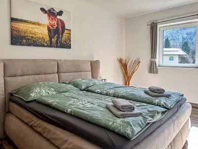 Ein Bett oder Betten in einem Zimmer der Unterkunft Ours Living Pihapper Blick - inkl Sauna