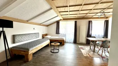 Ein Bett oder Betten in einem Zimmer der Unterkunft Living Apartments Saalbach