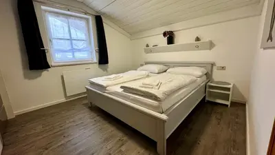 Ein Bett oder Betten in einem Zimmer der Unterkunft Living Apartments Saalbach