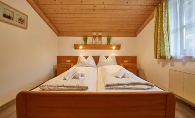 Ein Bett oder Betten in einem Zimmer der Unterkunft Living Apartments Saalbach
