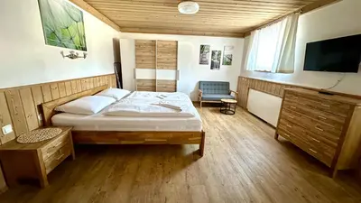 Ein Bett oder Betten in einem Zimmer der Unterkunft Living Apartments Saalbach