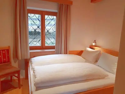 Ein Bett oder Betten in einem Zimmer der Unterkunft Chalet Mittersill