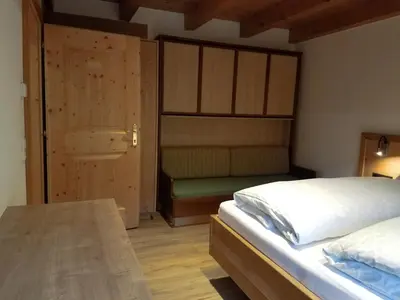Ein Bett oder Betten in einem Zimmer der Unterkunft Chalet Mittersill
