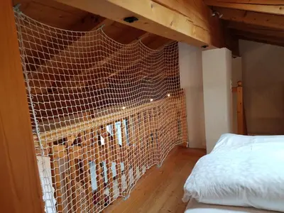 Ein Bett oder Betten in einem Zimmer der Unterkunft Chalet Mittersill