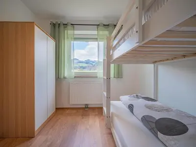 Ein Bett oder Betten in einem Zimmer der Unterkunft Kaiser Traum I
