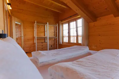 Ein Bett oder Betten in einem Zimmer der Unterkunft Mountain Lodge Stummerberg