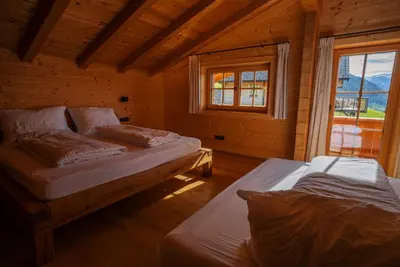 Ein Bett oder Betten in einem Zimmer der Unterkunft Mountain Lodge Stummerberg