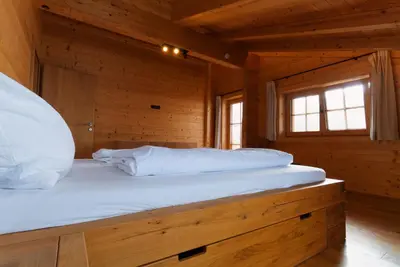 Ein Bett oder Betten in einem Zimmer der Unterkunft Mountain Lodge Stummerberg