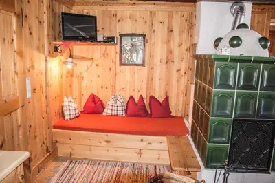 Ein Sitzbereich in der Unterkunft Sennhütte Mitterplatt'n