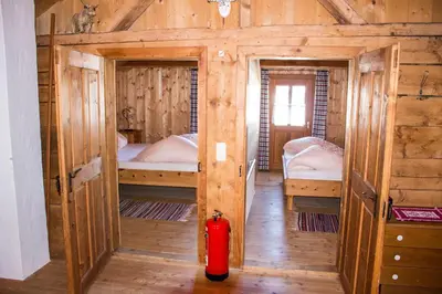 Ein Bett oder Betten in einem Zimmer der Unterkunft Sennhütte Mitterplatt'n