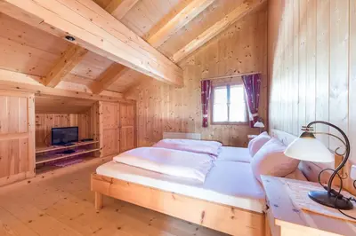 Ein Bett oder Betten in einem Zimmer der Unterkunft Sennhütte Mitterplatt'n