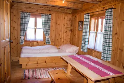Ein Bett oder Betten in einem Zimmer der Unterkunft Sennhütte Mitterplatt'n