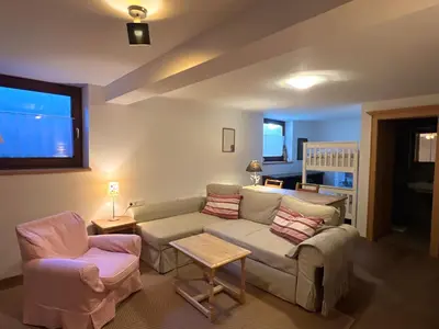 Ein Sitzbereich in der Unterkunft Chalet Aurach