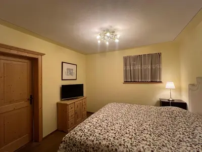 Ein Bett oder Betten in einem Zimmer der Unterkunft Chalet Aurach