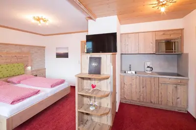 Ein Bett oder Betten in einem Zimmer der Unterkunft Landhaus Greil
