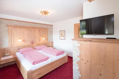 Ein Bett oder Betten in einem Zimmer der Unterkunft Landhaus Greil
