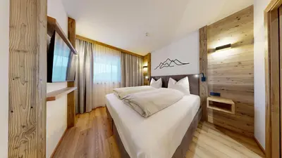 Ein Bett oder Betten in einem Zimmer der Unterkunft Moonlight Apartments
