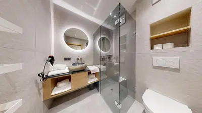Ein Badezimmer in der Unterkunft Moonlight Apartments