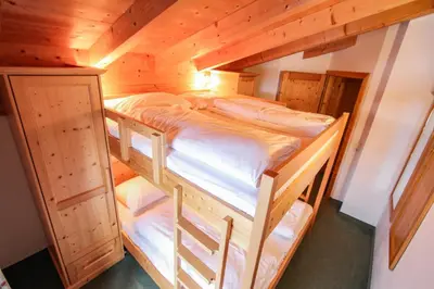 Ein Bett oder Betten in einem Zimmer der Unterkunft Chalet 155 - Hochkrimml