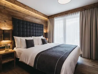 Ein Bett oder Betten in einem Zimmer der Unterkunft VAYA Post Saalbach Landhaus