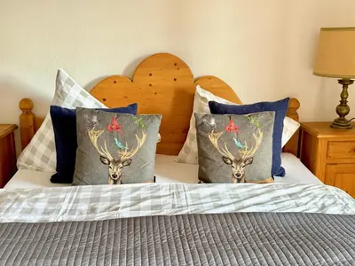 Ein Bett oder Betten in einem Zimmer der Unterkunft KitzDiamant with Pool, Sauna & Garden Deluxe by Belle-Stay