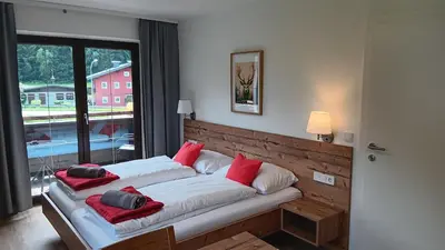 Ein Bett oder Betten in einem Zimmer der Unterkunft Haus Huber Zimmer und Apartments