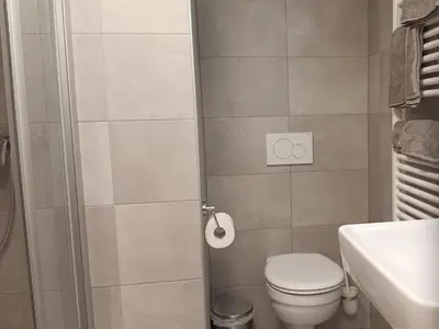 Ein Badezimmer in der Unterkunft Haus Huber Zimmer und Apartments