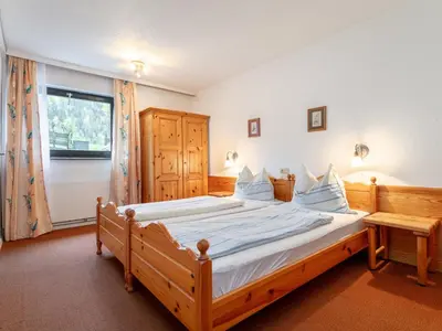Ein Bett oder Betten in einem Zimmer der Unterkunft An der Schiwiese