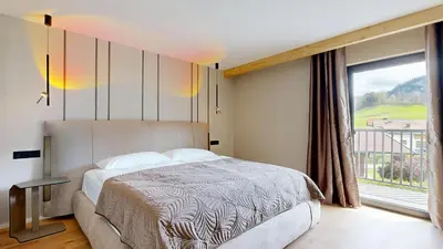 Ein Bett oder Betten in einem Zimmer der Unterkunft Stay Here Living Apartments
